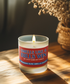 Handmade 14oz soy wax game day candle in frosted glass jar with team colors and label reading “Smells Like a [Team Name] Win.”