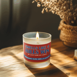 Handmade 14oz soy wax game day candle in frosted glass jar with team colors and label reading “Smells Like a [Team Name] Win.”