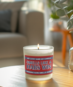 Handmade 14oz soy wax game day candle in frosted glass jar with team colors and label reading “Smells Like a [Team Name] Win.”