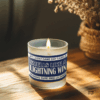 Handmade 14oz soy wax game day candle in frosted glass jar with team colors and label reading “Smells Like a [Team Name] Win.”