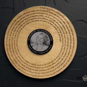 Album-inspired laser cut wooden keepsake designed like a vinyl record, featuring engraved text around the edge and a custom photo displayed on the centre label.