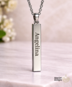 Stainless steel engraved bar necklace with custom name engraving shown with the name Angelina