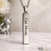 Stainless steel engraved bar necklace with custom name engraving shown with the name Cat Mom