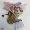 Handcrafted laser cut wooden magic keys with engraved tags, ribbons, and themed designs for Santa, Easter Bunny, and Tooth Fairy