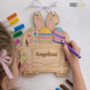 Laser cut wooden colouring kits that can be personalized with names and dates, including keepsake gifts and seasonal designs with non-toxic markers
