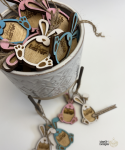 Laser cut wooden bunny Easter gift tags, hand painted and personalized with names, shown in natural wood and pastel colours