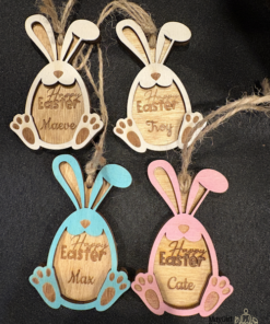Laser cut wooden bunny Easter gift tags, hand painted and personalized with names, shown in natural wood and pastel colours