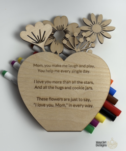 Laser cut wooden colouring kits that can be personalized with names and dates, including keepsake gifts and seasonal designs with non-toxic markers