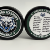 Custom personalized keepsake hockey pucks featuring team logos, player of the game designs, season details, and team roster layouts