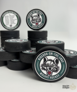 Custom personalized keepsake hockey pucks featuring team logos, player of the game designs, season details, and team roster layouts