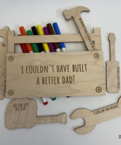Laser cut wooden colouring kits that can be personalized with names and dates, including keepsake gifts and seasonal designs with non-toxic markers