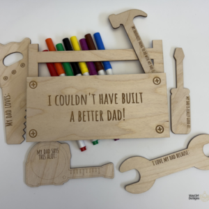Laser cut wooden colouring kits that can be personalized with names and dates, including keepsake gifts and seasonal designs with non-toxic markers