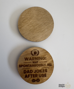 Round wooden magnetic bottle opener with engraved funny dad joke warning text and a customizable blank side