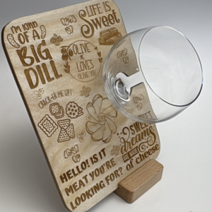 Custom engraved charcuterie boards in various wood styles and sizes, personalized for serving, gifting, and entertaining