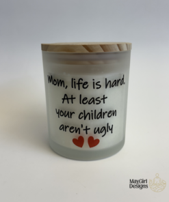 Cheeky handmade mom candles in frosted glass jars with funny Mother’s Day sayings and bamboo lids by MayGirl Designs.
