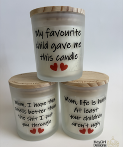 Cheeky handmade mom candles in frosted glass jars with funny Mother’s Day sayings and bamboo lids by MayGirl Designs.