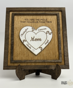 Personalized wooden puzzle heart frame with family names and the message you are the piece that holds us together