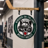 Custom hockey dressing room door sign with magnetic hockey stick hanger