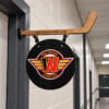 Custom hockey dressing room door sign with magnetic hockey stick hanger